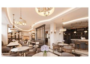 a restaurant with tables and chairs and a bar at Hotel Montmartre de Sapa - Newly Opened April 2026 in Sapa