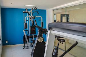 The fitness centre and/or fitness facilities at Mont Blanc Apart Hotel - Duque de Caxias