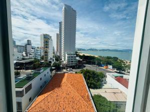 a view of a city from a building at VANDA Hotel Nha Trang in Nha Trang