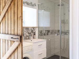 a bathroom with a shower and a sink at Maison Vintage de Kerlipot in Ploubezre +20 photos