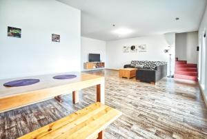 a living room with a table and a couch at U Jeřába - komplex B in Horní Věstonice
