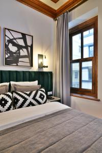 a bedroom with a large bed and a window at Istanbul Life Hotel in Istanbul