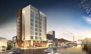 eine künstlerische Darstellung eines für die Stadt geplanten Hotels in der Unterkunft Bay Hound Hotel in Busan