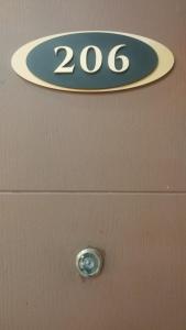 a close up of a drawer with a sign on it at Selah Hotel Dipolog in Dipolog