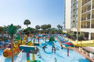a group of people playing in a water park at Sea Crest Oceanfront Resort in Myrtle Beach