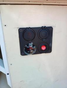 a traffic light attached to a white wall at Tenerife Camper Van Teide Surf and Beaches Sleeps 2 in San Miguel de Abona