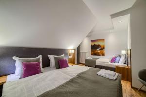 Posteľ alebo postele v izbe v ubytovaní Hotel Górski