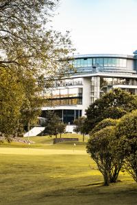 a building with a golf course in front of it at Sankt Jörgen Park in Gothenburg
