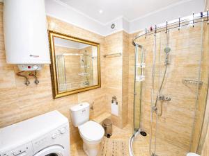 a bathroom with a toilet and a shower at Harmony Dream Island 9 Private Apartment 618 in Sunny Beach +23 photos
