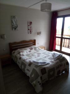 Postel nebo postele na pokoji v ubytování Gîte Châtel