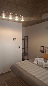 a bedroom with a large bed in a room at DreamHouse in Bari