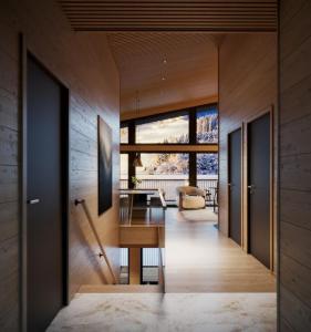 a dining room with a table in a house at TAHKO LAKESIDE VILLA D 2 in Tahkovuori +3 photos