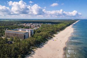 an aerial view of the beach and the ocean at Apartament Prestige 224 - tuż przy plaży -BASEN, sauna, jacuzzi w cenie pobytu - Easy - Rent Apartments in Pobierowo