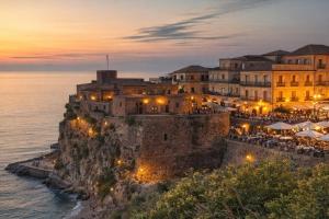 a town on the edge of the ocean at night at Sant'Agostino in Pizzo