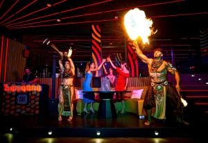 a group of performers on the stage at a performance at Universal Hotel Neptuno - Adults Only in Playa de Palma