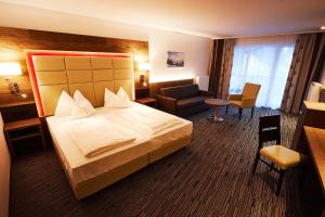 Posteľ alebo postele v izbe v ubytovaní Hotel Wagrainerhof