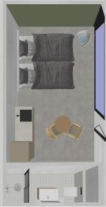 a drawing of a room with a bed and a table at Outdoors Holten - Forest Cabin in Holten