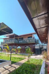 an external view of the university of sydney building at Mayas Stay in Busia +12 photos