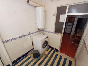 a bathroom with a toilet in a room at GERMANIES HOME y Garaje , Algemesí Home in Algemesí