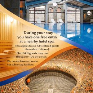 a advertisement for a swimming pool with a sign in front at Chalet Mila - Total Chalets - Catered Chalet in Bansko