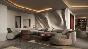 a living room with a couch and a table at Gourmet & Wine Hotel Austria - 4 Sterne superior - Hike & Bike in Obergurgl