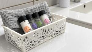 a bottle holder on a counter in a bathroom at Elli's House - Apartment in Lixouri +7 photos