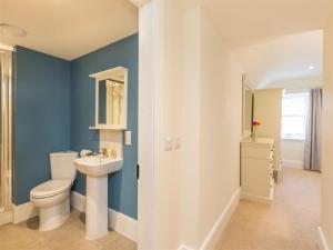 a bathroom with a toilet and a sink at 6 Bed in Strathcarron oc-ca343 in Applecross +14 photos