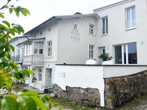 a building with the words trust system written on it at Haus ROSENSTEIN in Sassnitz