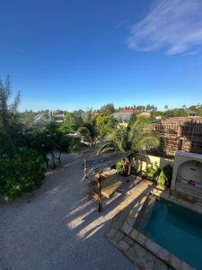 an overhead view of a villa with a swimming pool at Uroa Sunset Bliss in Uroa
