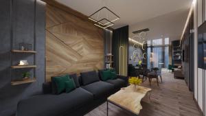 a living room with a blue couch and green pillows at VILSON hotel in Bukovel
