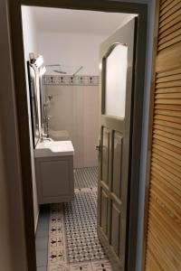 a bathroom with a sink and a mirror at Nostalgia in Turda +67 photos