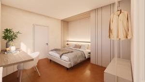 a bedroom with a bed and a table and a desk at B&B Villa Giuliana in Arnesano +36 photos