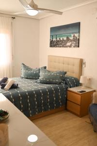 a living room with a bed and a table at Villa Preciosa de Luxe and Spa in Mazarrón +219 photos