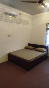 a bedroom with a bed in a room at Aqua Dream Adventures Resort in Trincomalee