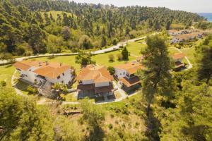 an aerial view of a large house with a yard at Elani Blue Coast Maisonette in Elani