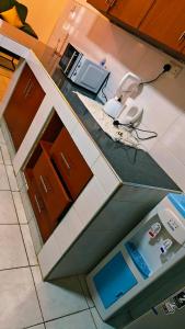 an aerial view of a kitchen with a counter top at Shima Complex in Nakuru