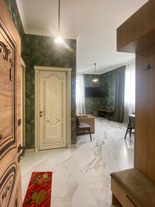 a large living room with a large marble floor at S-Van Cozy Home in Sevan