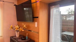 a room with a window and a vase of flowers on a table at Asenata Apartament 46m2 Ustroń Centrum in Ustroń +31 photos