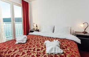 Postel nebo postele na pokoji v ubytování Hotel Azzurro