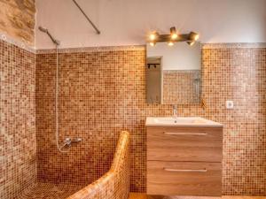 a bathroom with a shower and a sink and a mirror at Ideal Property Mallorca - Corro Sant Jaume in Alcudia +51 photos
