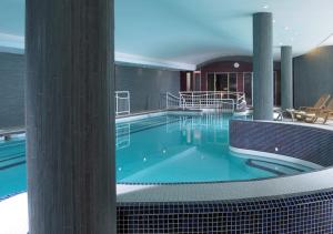 a large swimming pool in a hotel room at Maryborough Hotel & Spa in Cork