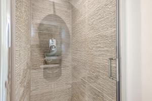 a bathroom with a sink and a shower at 3 Bed in Holt oc-2280 in Holt +14 photos