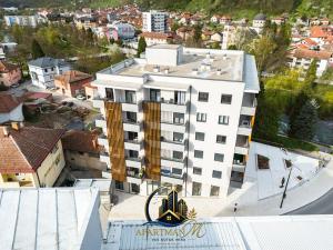 an aerial view of a building in a city at ApartmanMFoca in Foča
