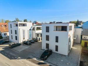 an aerial view of a city with buildings and cars at Studio 04 - Einzimmerapartment klimatisiert in Friedrichshafen