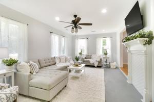 a living room with a couch and a tv at Memes Cottage Near Nelson 151 in Afton