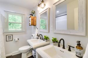 a bathroom with a sink and a toilet and a mirror at Memes Cottage Near Nelson 151 in Afton +27 photos