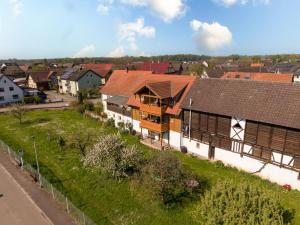 an aerial view of a village with houses at Dieboldshof in Neuried