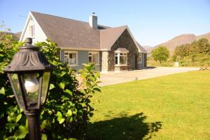 a street light in front of a house at Black Valley lodge in Killarney