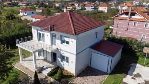 an aerial view of a house with a garage at Vila Kabashi in Korçë
