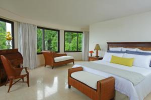 Cama ou camas em um quarto em Dreams Playa Bonita All Inclusive